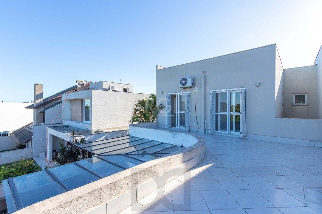Casa para Venda com 4 dormitórios no bairro Hípica — foto 28