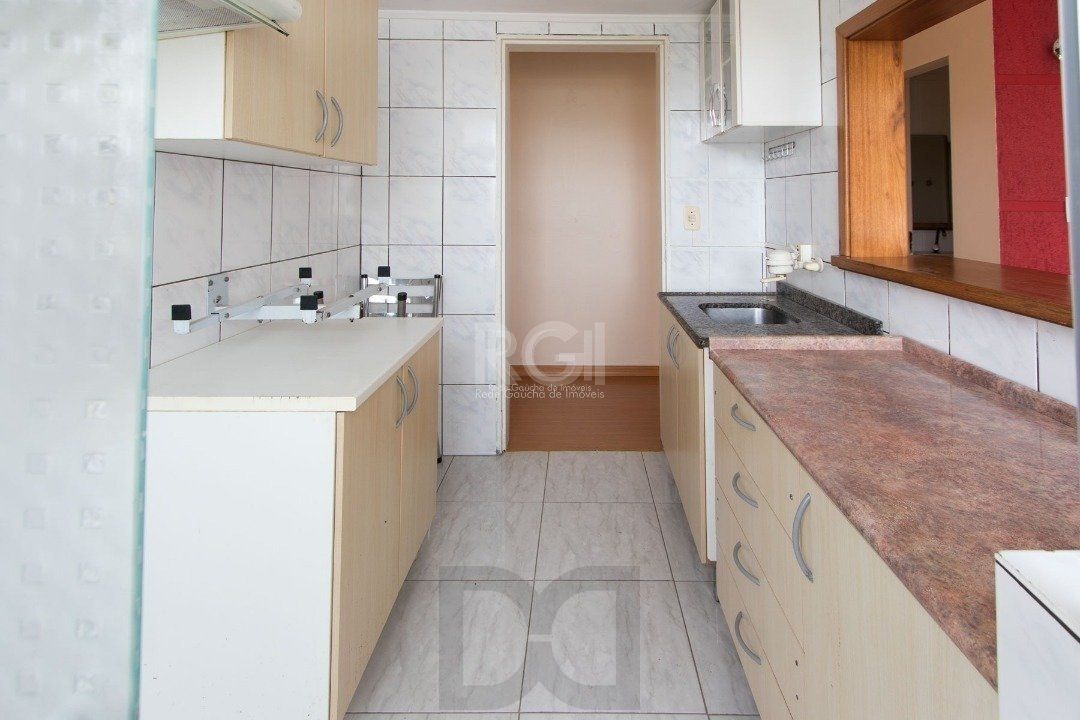 Apartamento de 2 dormitórios e 1 vaga de garagem no bairro Cristal. — foto 9