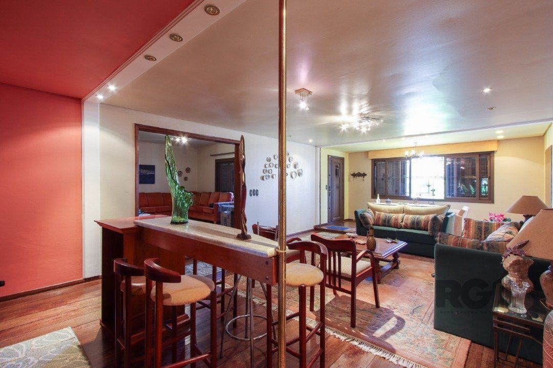 Casa a venda com 03 dormitórios, living 03 ambientes com vista para o Rio. — foto 8