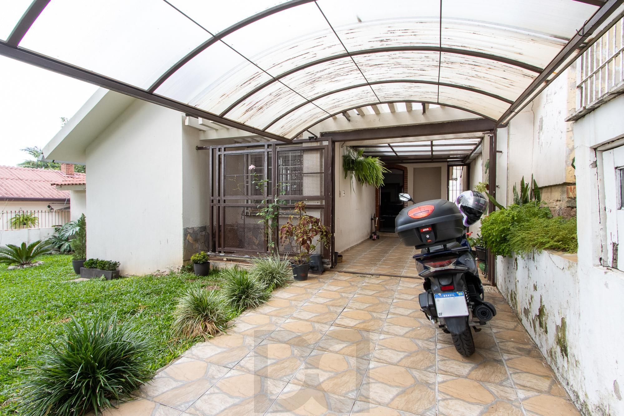 Casa de 4 dormitórios, 2 suítes, piscina, pátio e 2 vagas de garagem. — foto 6