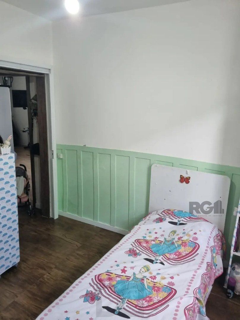 Casa térrea, 3 dormitórios, 1 suíte, living para 2 ambientes, cozinha, pátio, 2 banheiros e 4 vagas . — foto 11
