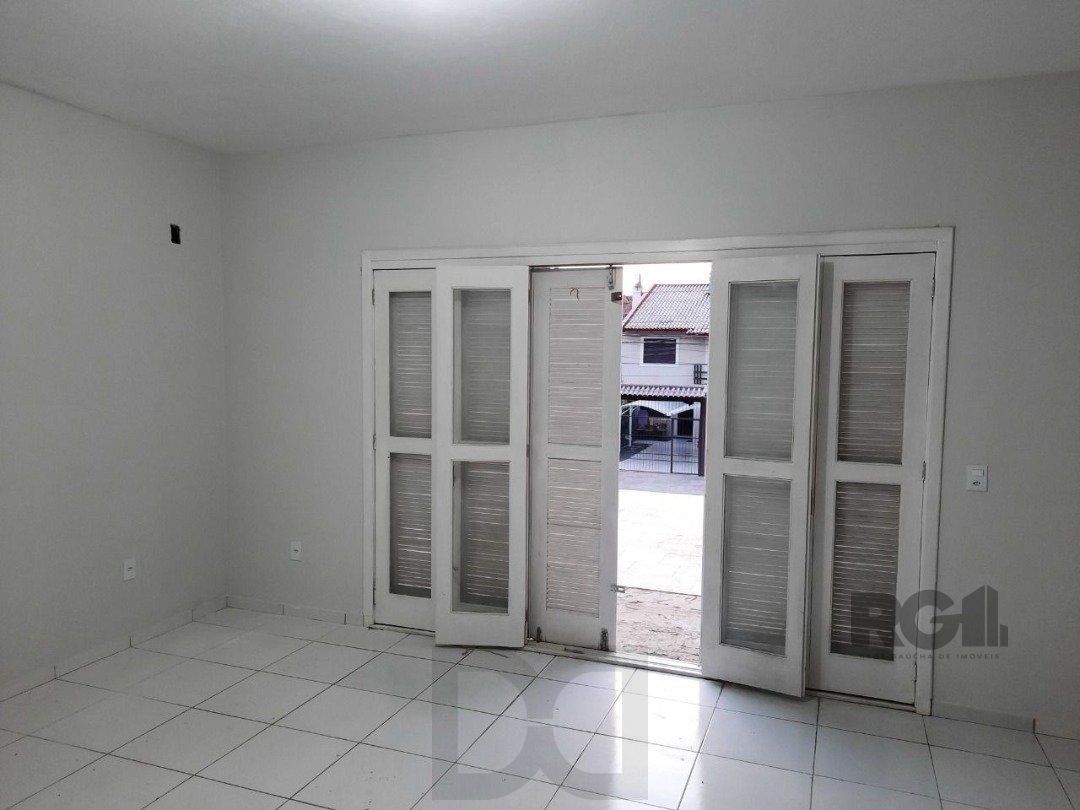 Oportunidade Imperdível: Prédio com 4 Apartamentos, Pátio e 2 Vagas de Garagem — foto 17