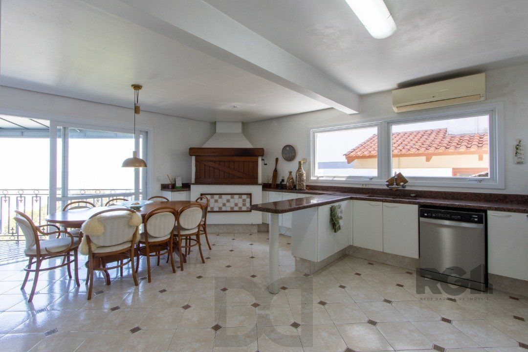 Casa deslumbrante vista do Guaiba, 3 dormitórios, sendo 1 suite master com closet e banheira de hidro com vista para o rio — foto 20