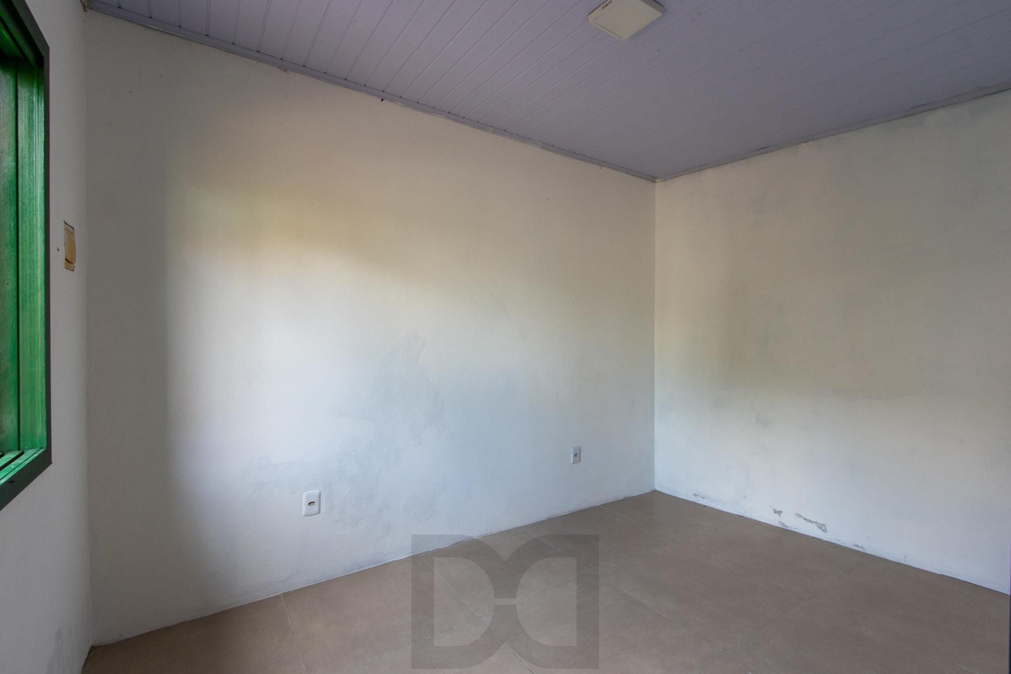 Terreno medindo 11 X 39,66 com 2 casas de alvenaria - Bairro Guarujá — foto 25