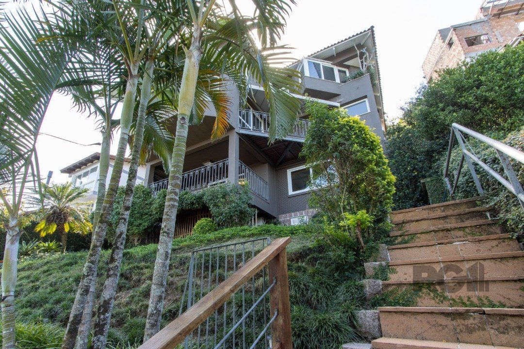 Casa deslumbrante vista do Guaiba, 3 dormitórios, sendo 1 suite master com closet e banheira de hidro com vista para o rio — foto 42