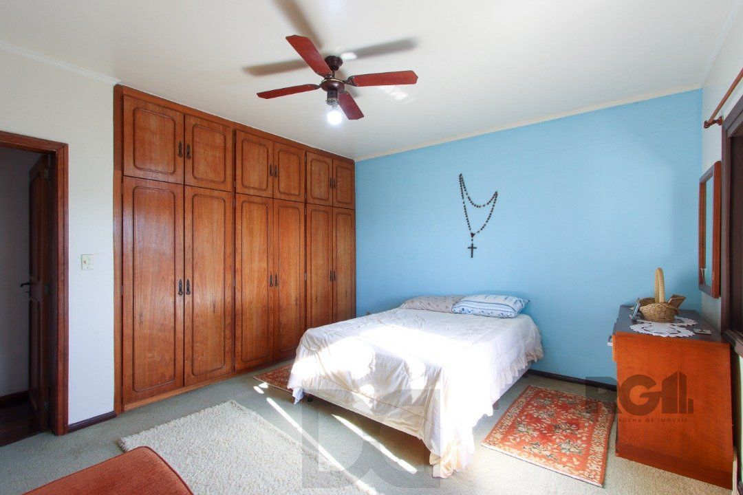 Casa a venda com 03 dormitórios, living 03 ambientes com vista para o Rio. — foto 32