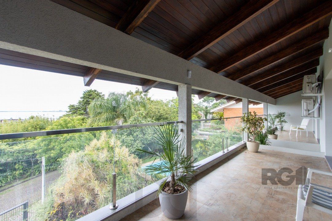 Sobrado com vista para Rio, 3 quartos, 2 suites, pátio, piscina, vaga para 4 carros - Bairro Vila Assunção — foto 1