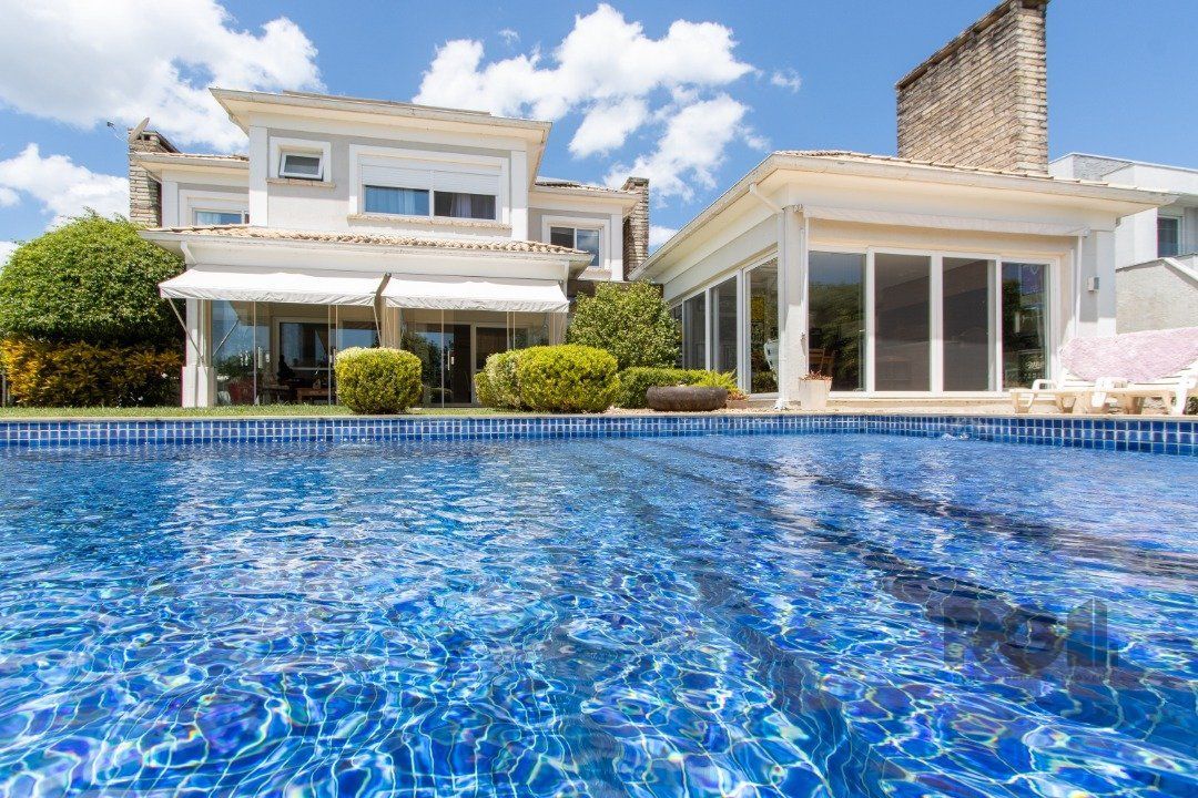 Excelente residência no Condomínio Terra Ville com aproximadamente 474,74m² privativos. — foto 47