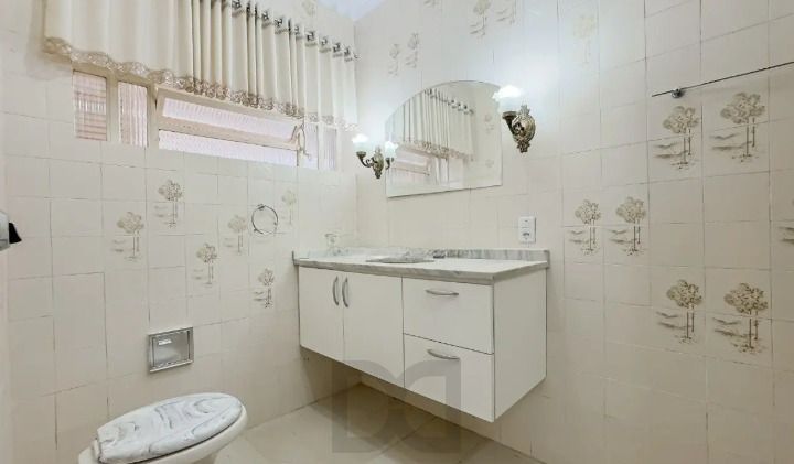 Casa de 3 dormitórios, 1 suíte e 3 vagas de garagem, bairro Ipanema. — foto 10