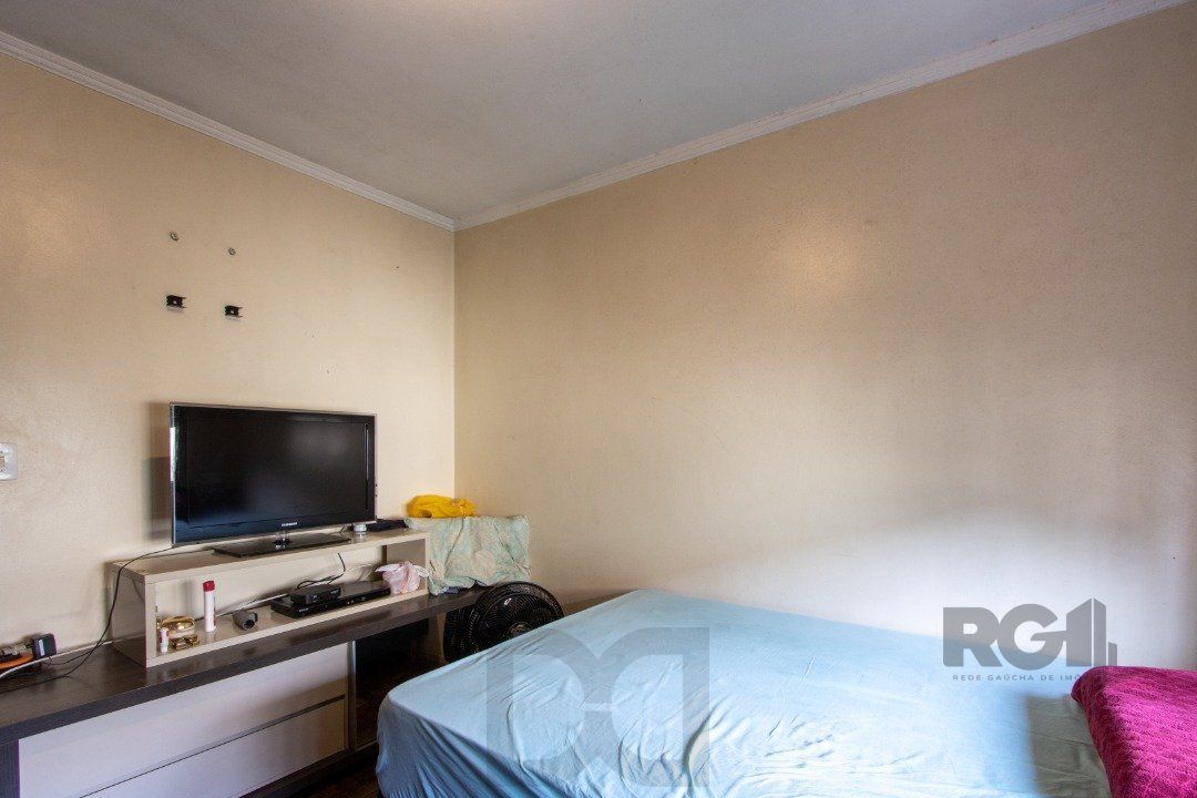 Apartamento com 70m² de área privativa, possui 3 dormitórios, sala para 2 ambientes, banheiro social, cozinha com móveis planejados e área de serviço. — foto 23