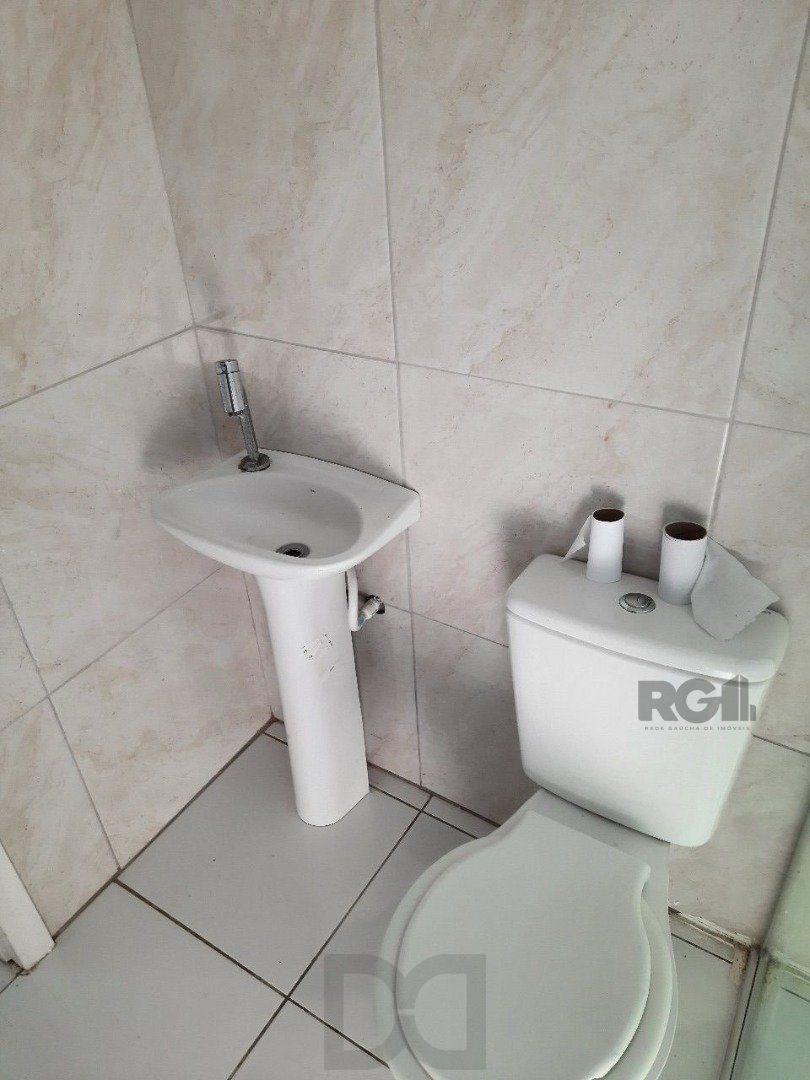 Oportunidade Imperdível: Prédio com 4 Apartamentos, Pátio e 2 Vagas de Garagem — foto 3