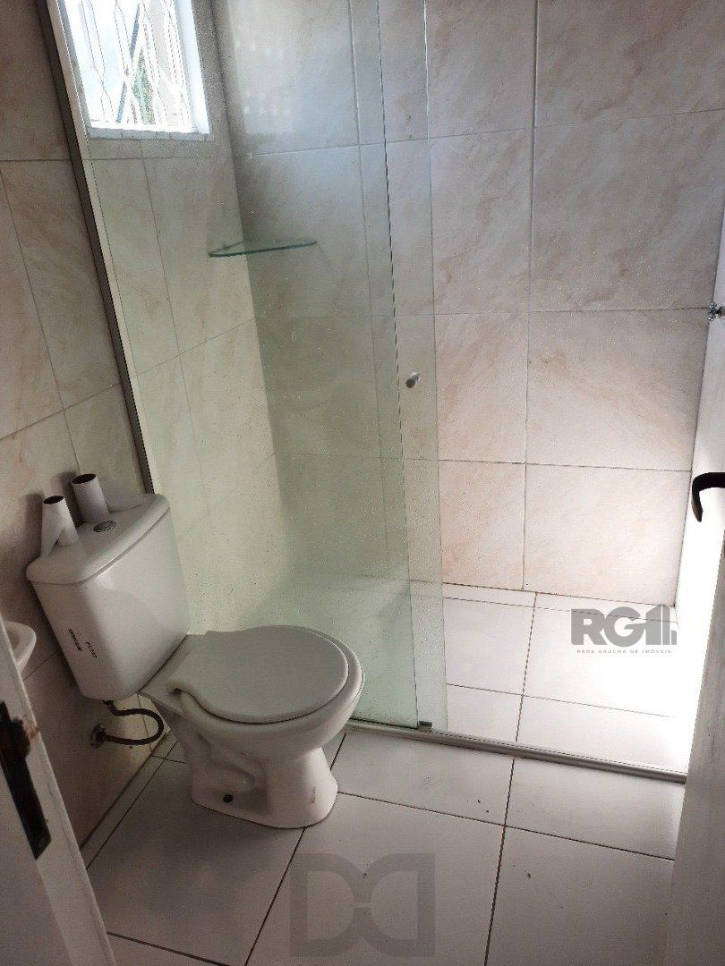 Oportunidade Imperdível: Prédio com 4 Apartamentos, Pátio e 2 Vagas de Garagem — foto 2
