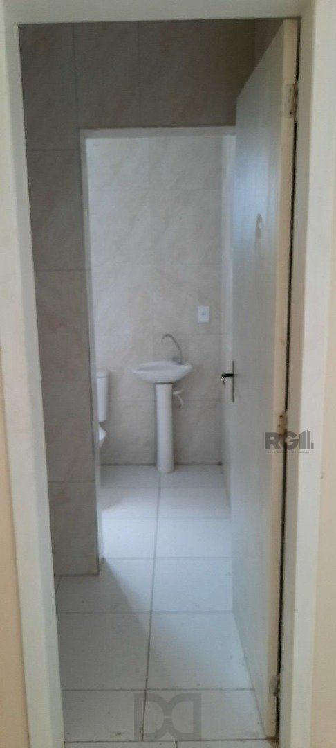 Oportunidade Imperdível: Prédio com 4 Apartamentos, Pátio e 2 Vagas de Garagem — foto 37