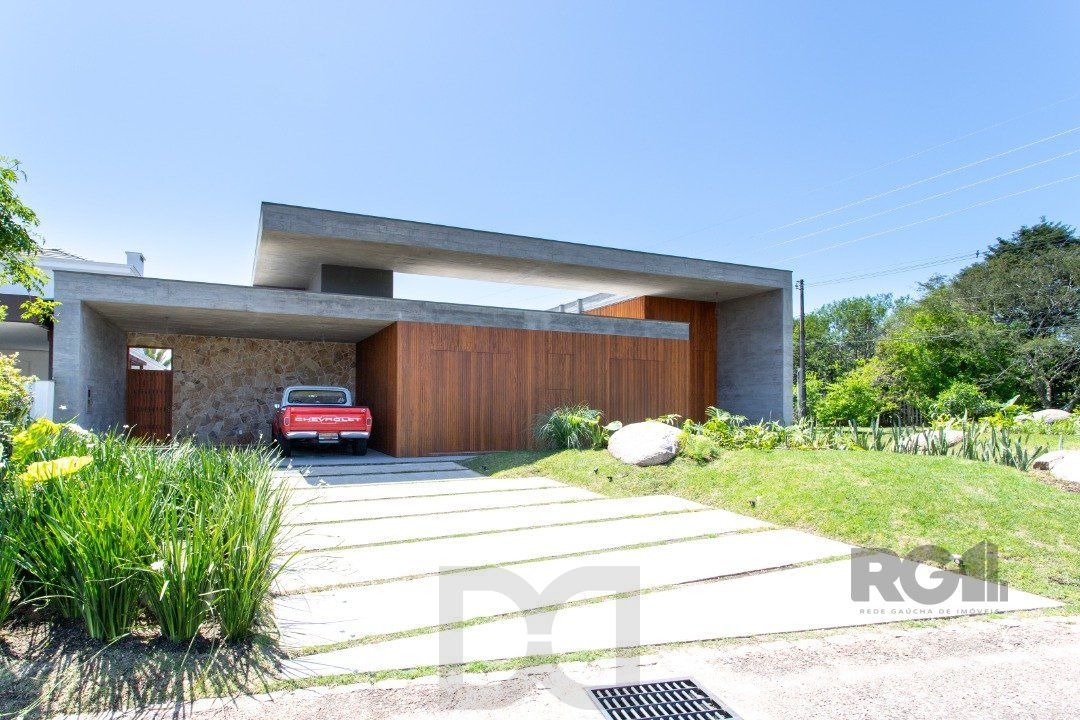 A Casa Le Mans, uma residência térrea de esquina com 389,48m2 de área coberta — foto 1