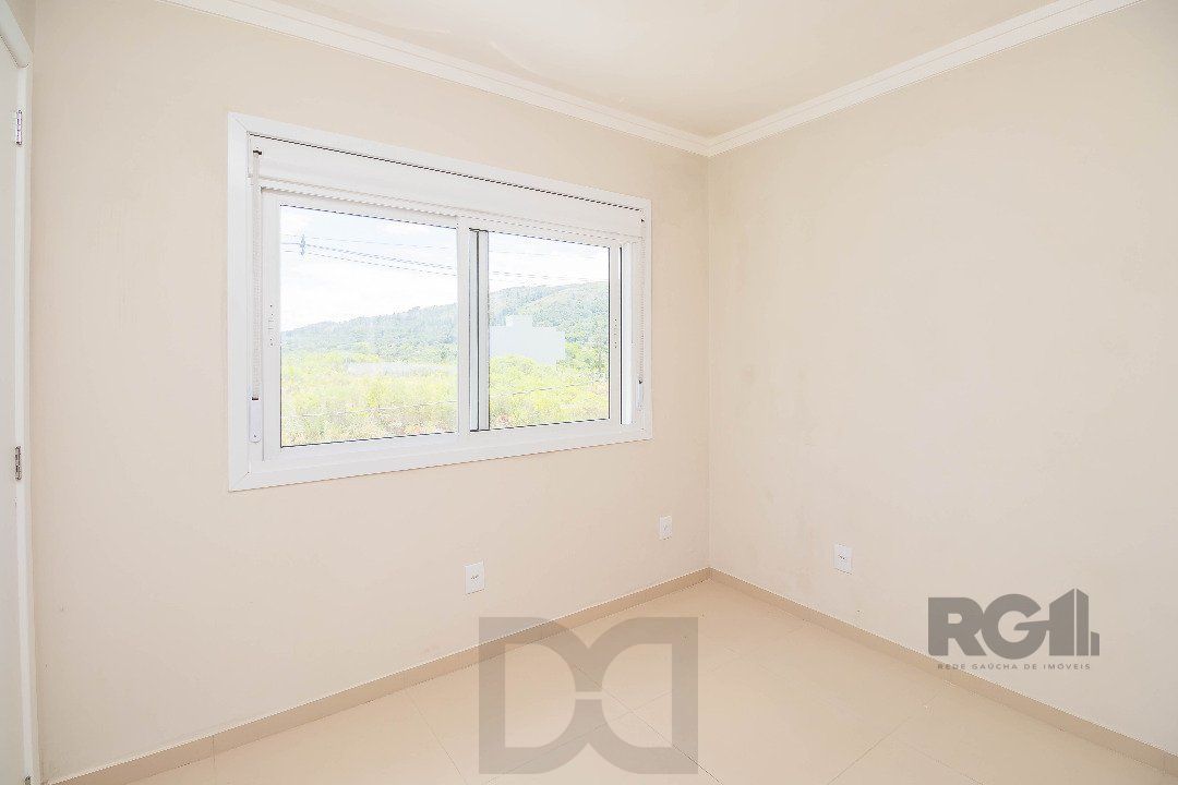 Sobrado, 185 metros quadrados privativo, com 3 quartos, 1 suíte, Living e cozinha integrados, lareira, churrasqueira, lavabo e 2 vagas de garagem. e 2 vagas de garagem — foto 22