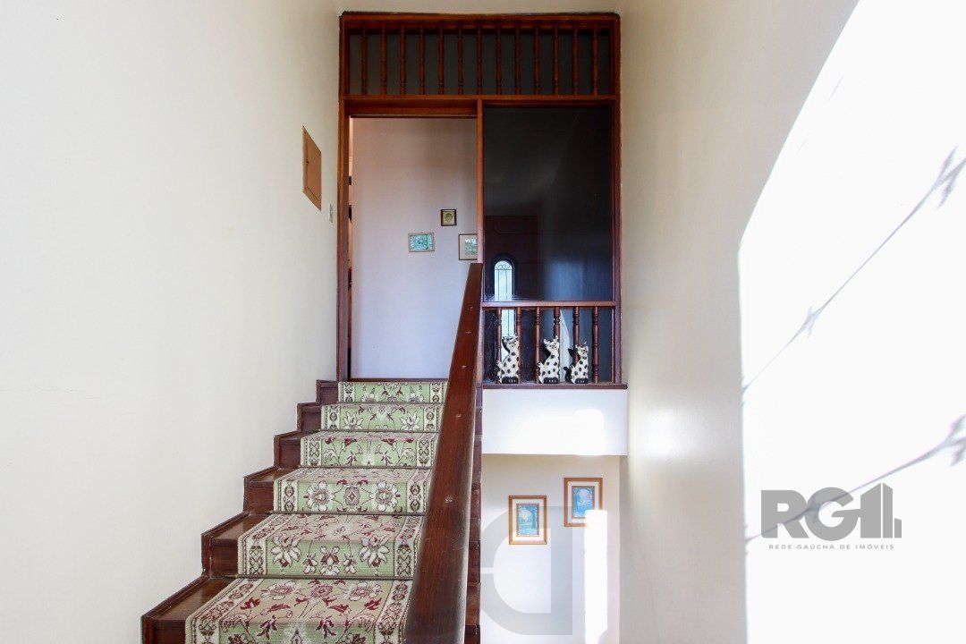 Casa a venda com 03 dormitórios, living 03 ambientes com vista para o Rio. — foto 25