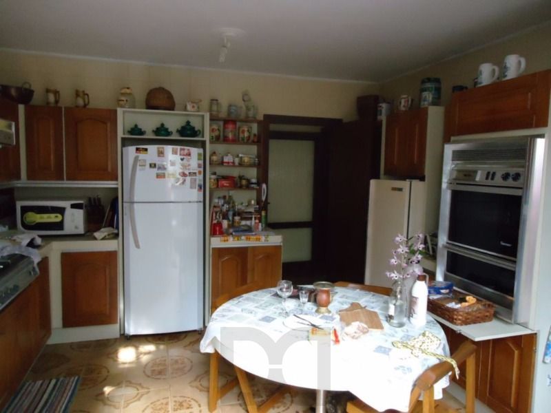 Casa para Venda - 290m², 3 dormitórios, sendo 1 suites, 3 vagas - Nonoai — foto 7