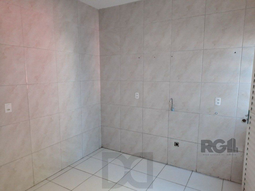Oportunidade Imperdível: Prédio com 4 Apartamentos, Pátio e 2 Vagas de Garagem — foto 11