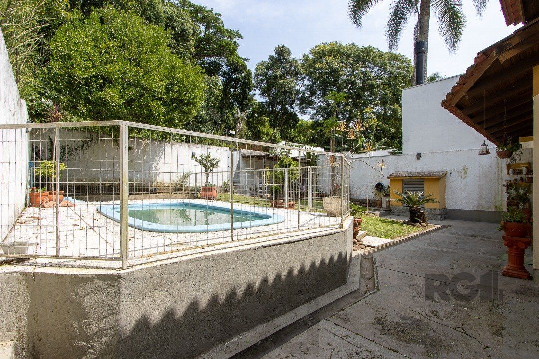 Casa para Venda - 300m², 3 dormitórios, sendo 1 suites, 4 vagas - Nonoai — foto 24