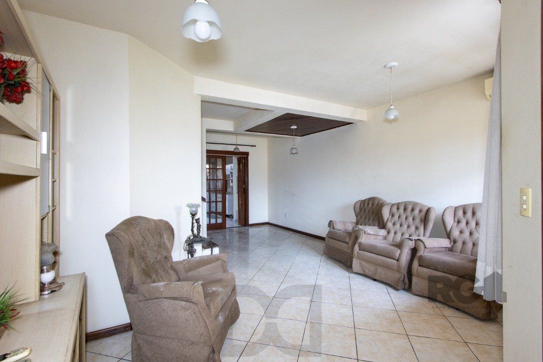 Casa em Condomínio na Zona Sul, no bairro Hípica, com 2 dormitórios, living para dois ambientes, cozinha mobiliada, lavabo — foto 5