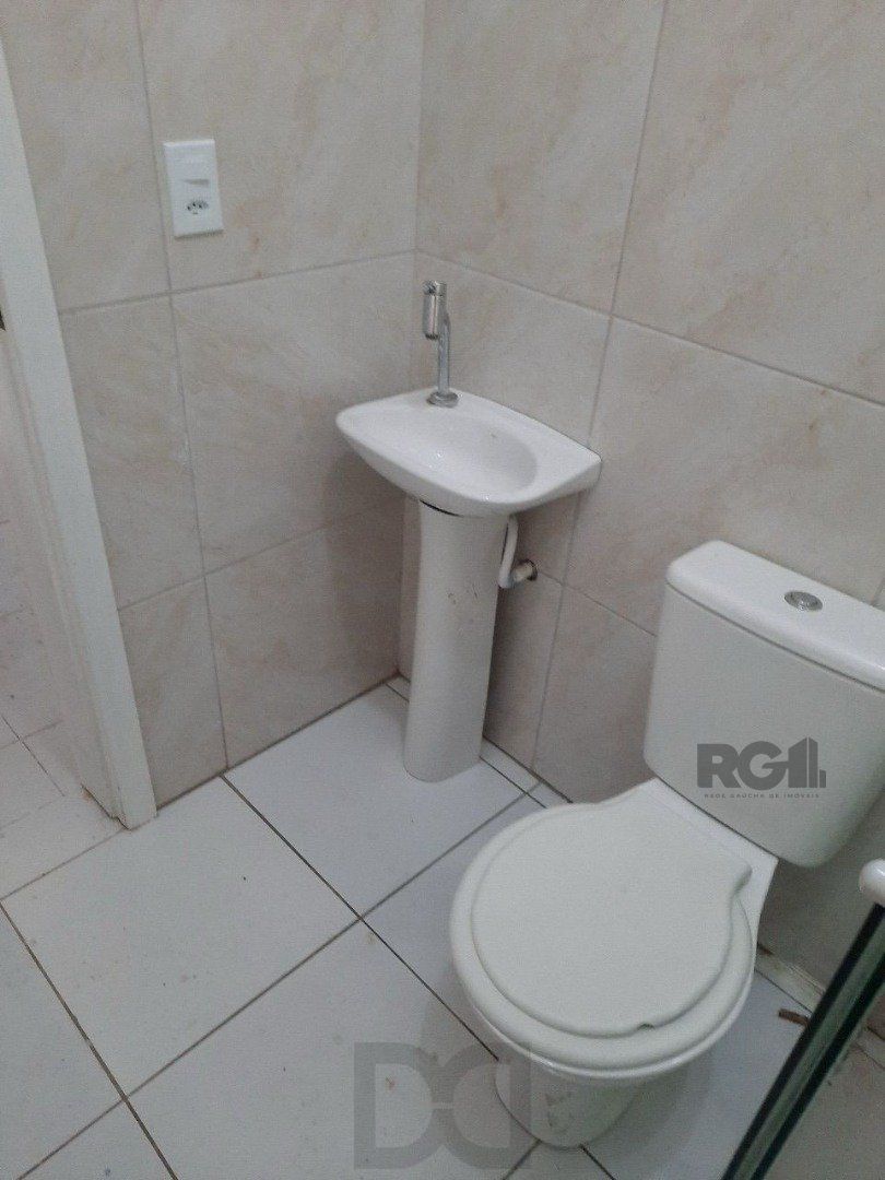 Oportunidade Imperdível: Prédio com 4 Apartamentos, Pátio e 2 Vagas de Garagem — foto 27