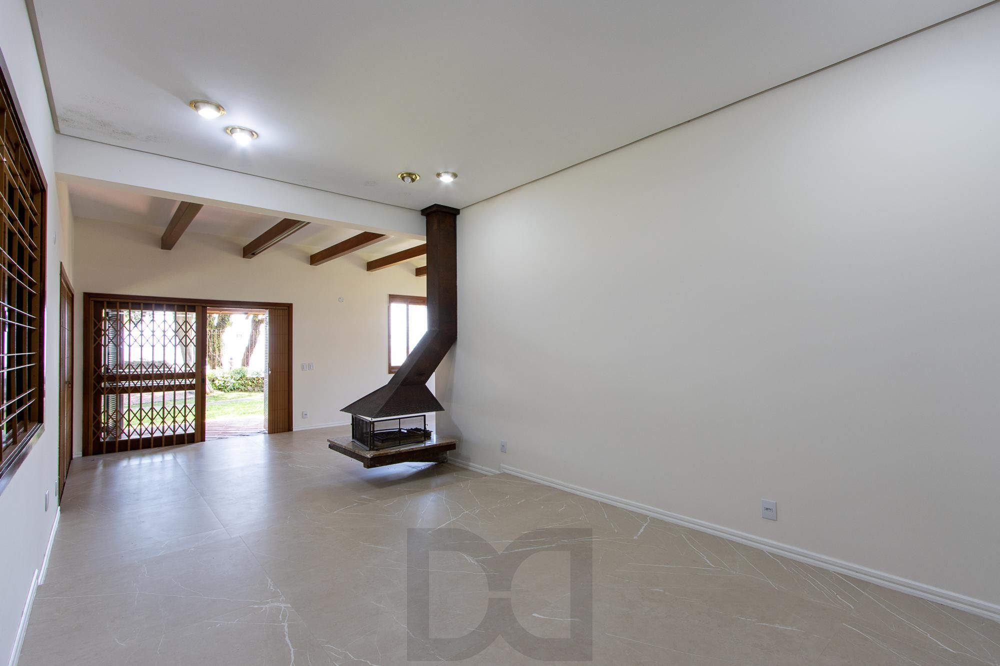 Casa com 2 dormitórios 3 banheiros. lareira e churrasqueira, e com arquitetura moderna. — foto 3