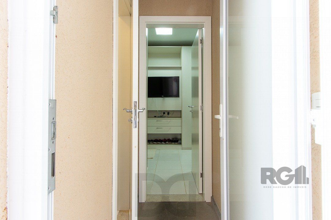 Casa no Condomínio Las Rocas, vista para o Guaíba, com 5 suítes — foto 32
