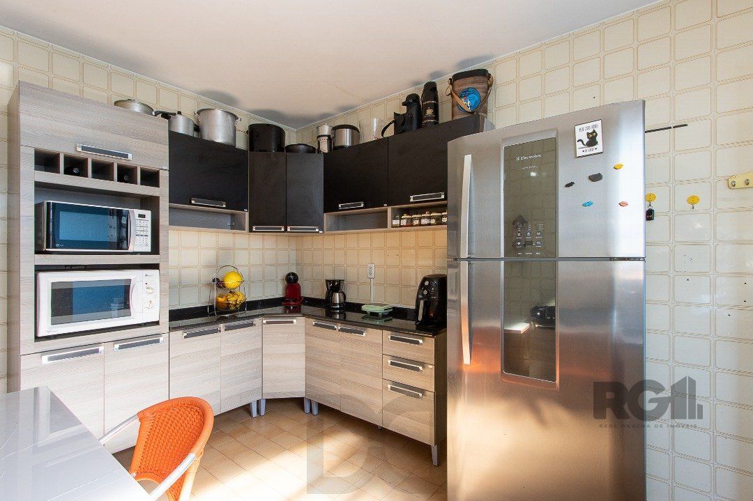 Casa térrea, com 3 dormitórios, 1 suíte, no bairro Ipanema. — foto 27