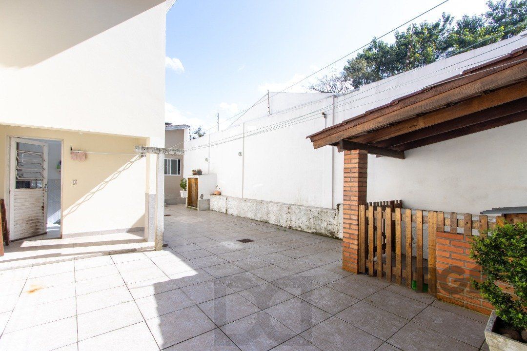 Casa a venda no bairro Guarujá com 4 dormitórios, piscina e salão de festas — foto 21
