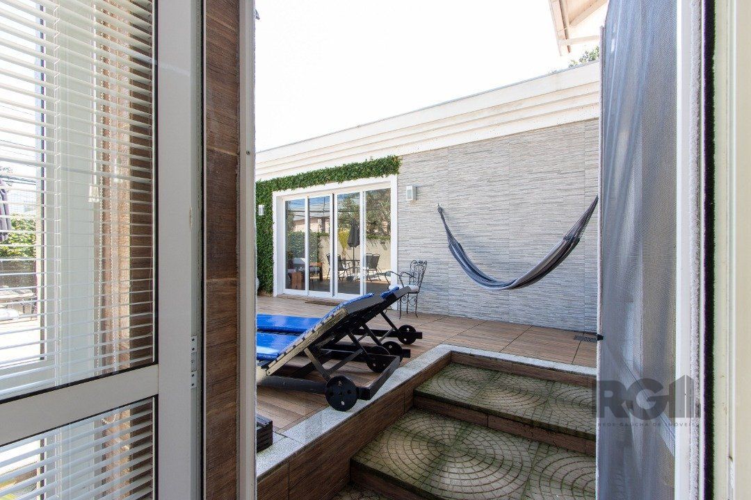 Casa a venda no bairro Guarujá com 4 dormitórios, piscina e salão de festas — foto 23