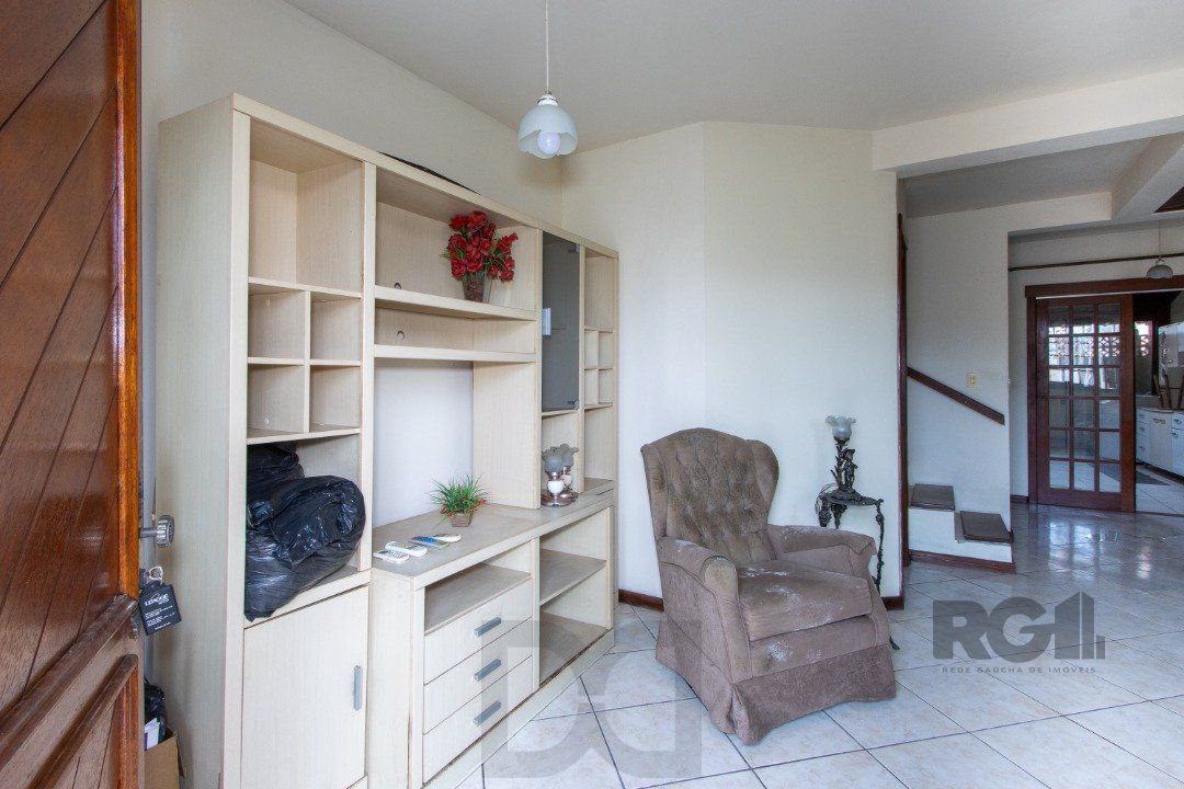 Casa em Condomínio na Zona Sul, no bairro Hípica, com 2 dormitórios, living para dois ambientes, cozinha mobiliada, lavabo — foto 4