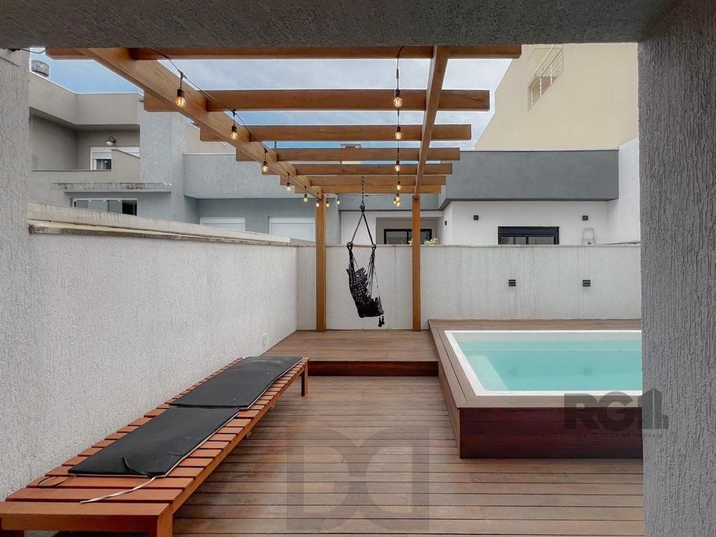 Encantadora residência em condomínio fechado no bairro Hípica. — foto 11
