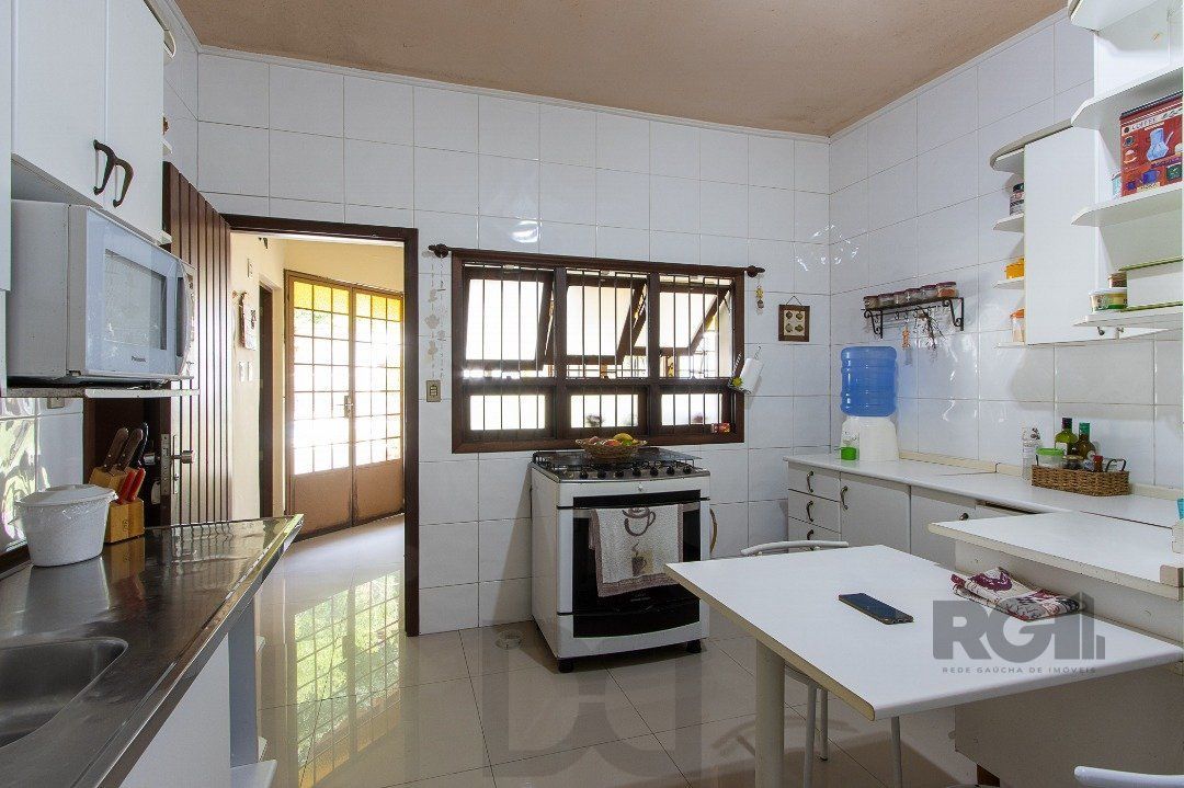 Casa para Venda - 300m², 3 dormitórios, sendo 1 suites, 4 vagas - Nonoai — foto 15