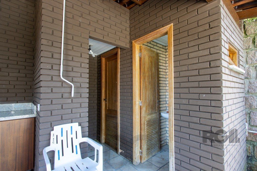 Casa deslumbrante vista do Guaiba, 3 dormitórios, sendo 1 suite master com closet e banheira de hidro com vista para o rio — foto 46