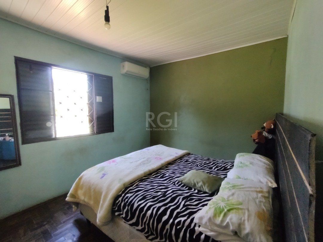 Casa para Venda - 100m², 3 dormitórios, 2 vagas - Lomba do Pinheiro — foto 4