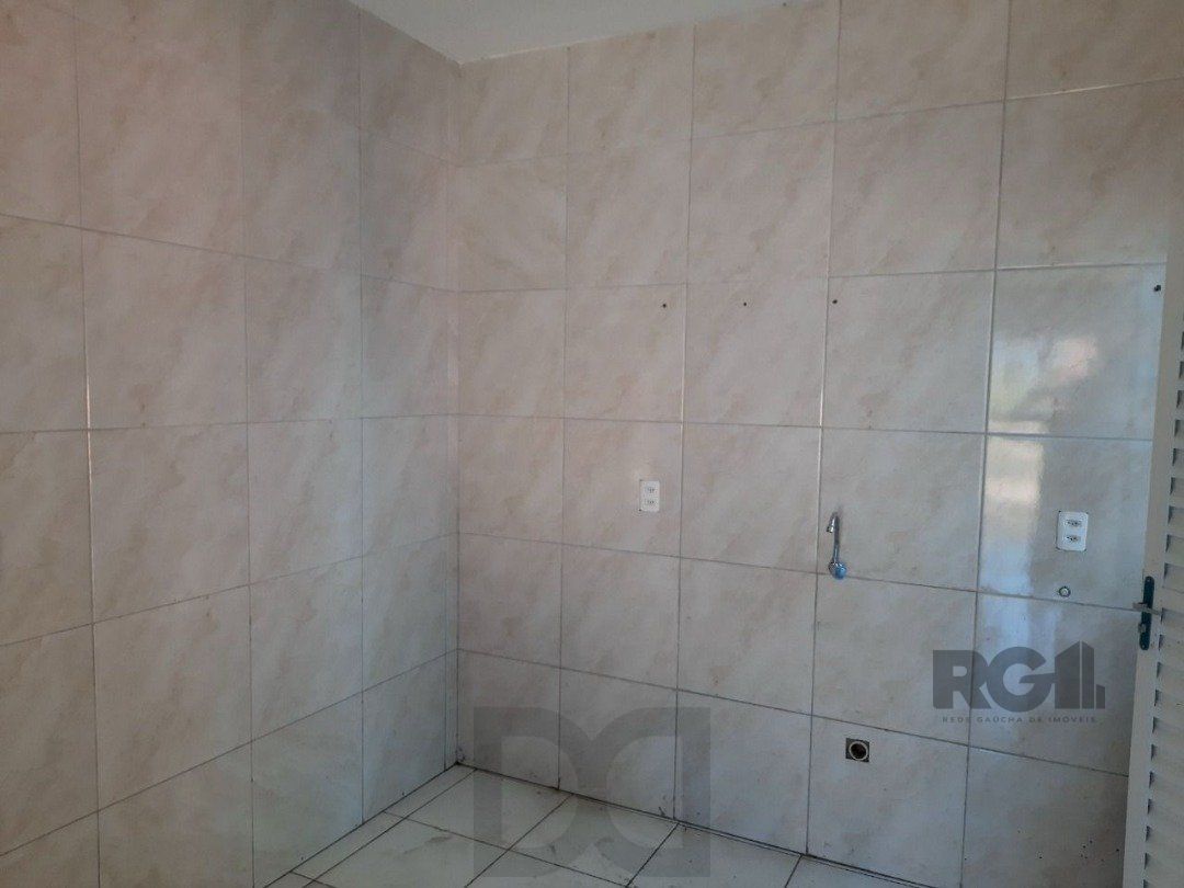 Oportunidade Imperdível: Prédio com 4 Apartamentos, Pátio e 2 Vagas de Garagem — foto 12