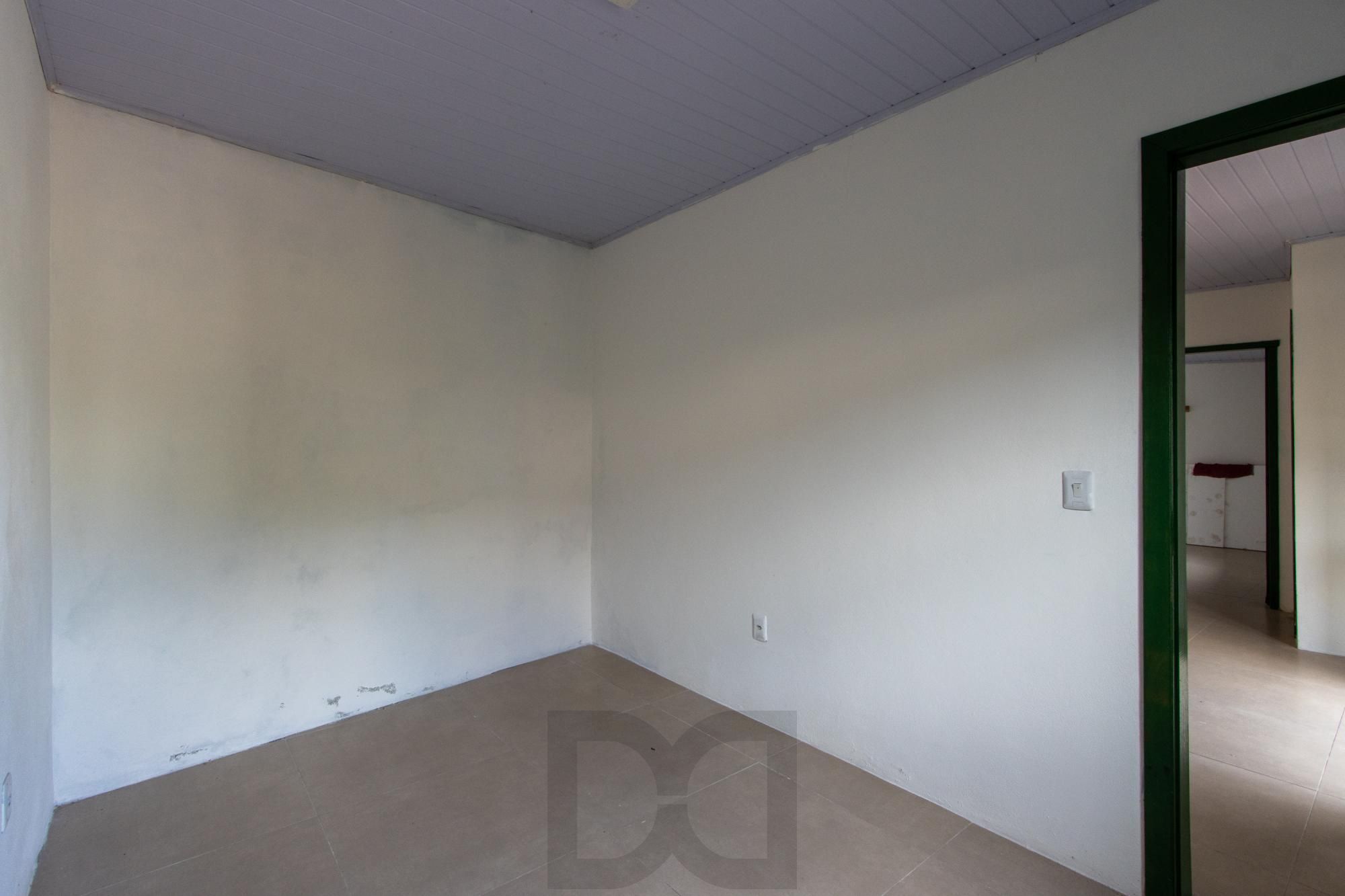 Terreno medindo 11 X 39,66 com 2 casas de alvenaria - Bairro Guarujá — foto 26