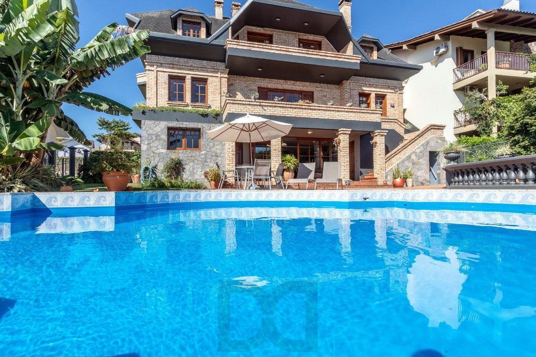 Casa Condominio para Venda - 559m², 4 dormitórios, sendo 3 suites, 3 vagas - Cavalhada — foto 2