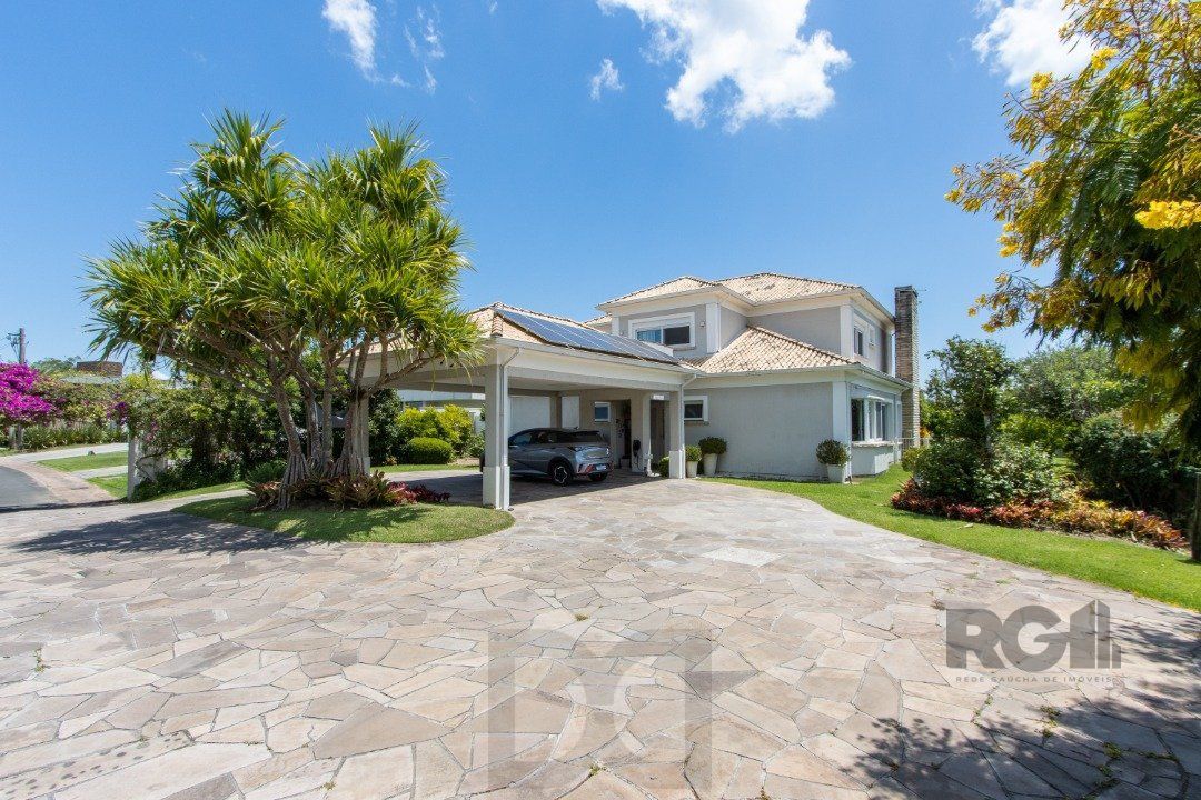 Excelente residência no Condomínio Terra Ville com aproximadamente 474,74m² privativos. — foto 2