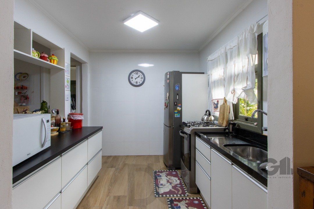 Casa térrea, 3 quartos, edícula, com 2 suites, pátio - Bairro Guarujá — foto 12