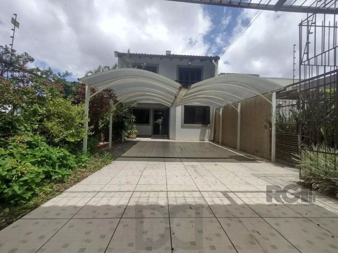 Casa 4 dormitórios, Bairro Cavalhada. — foto 3