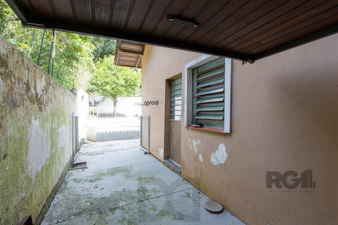 Casa para Venda - 300m², 3 dormitórios, sendo 1 suites, 4 vagas - Nonoai — foto 30