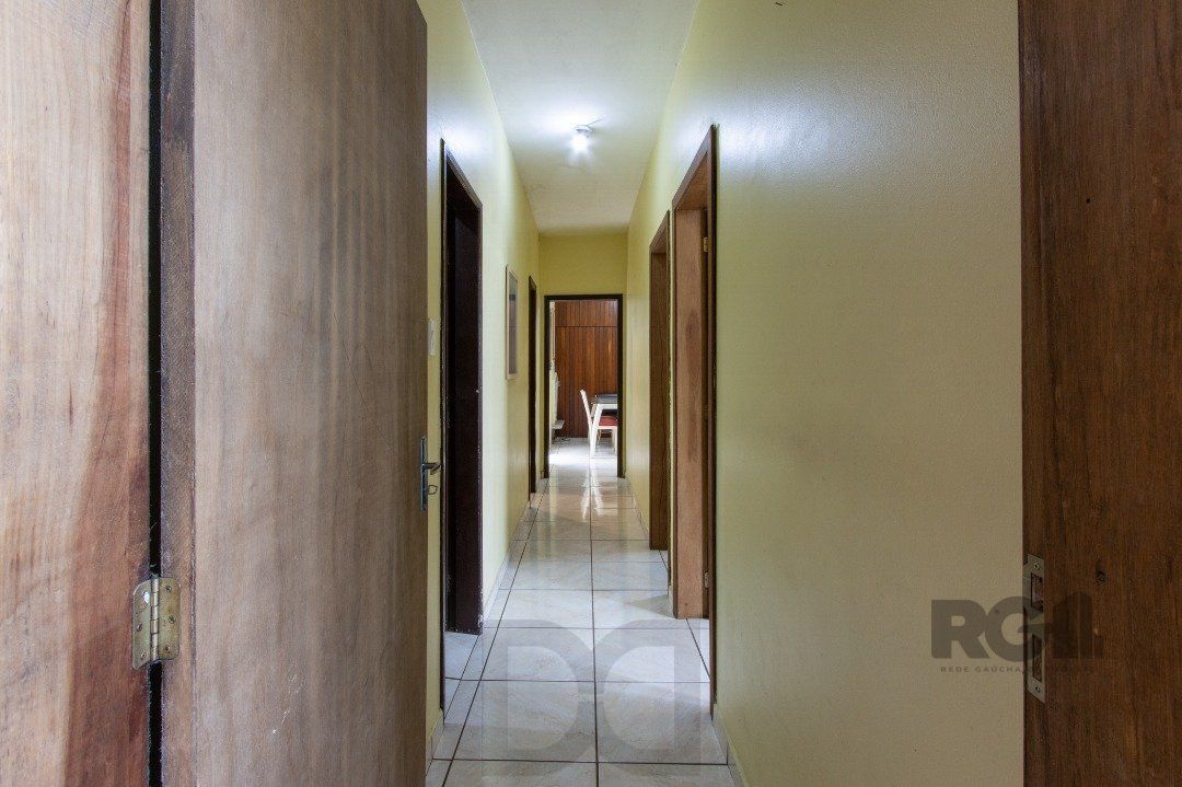 Casa térrea, 3 quartos, 2 banheiros, com pátio no Bairro Cavalhada — foto 27