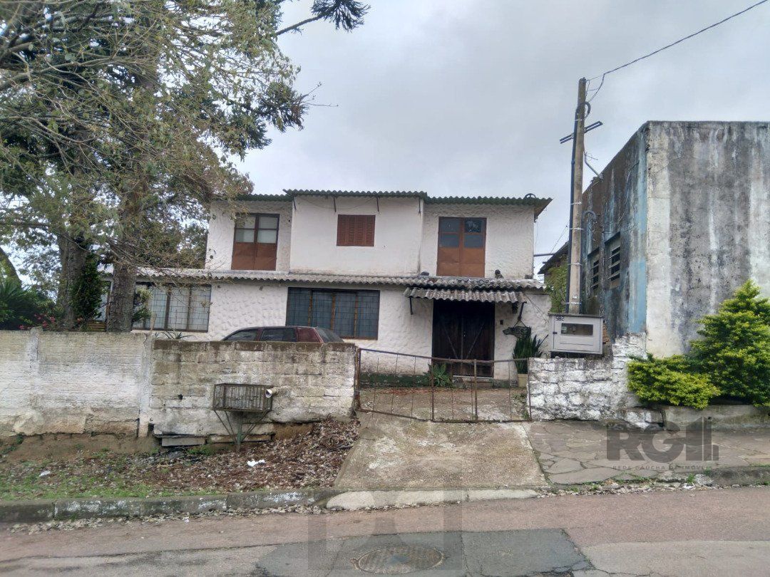 Casa 5 dormitórios, bairro Camaquã. — foto 2