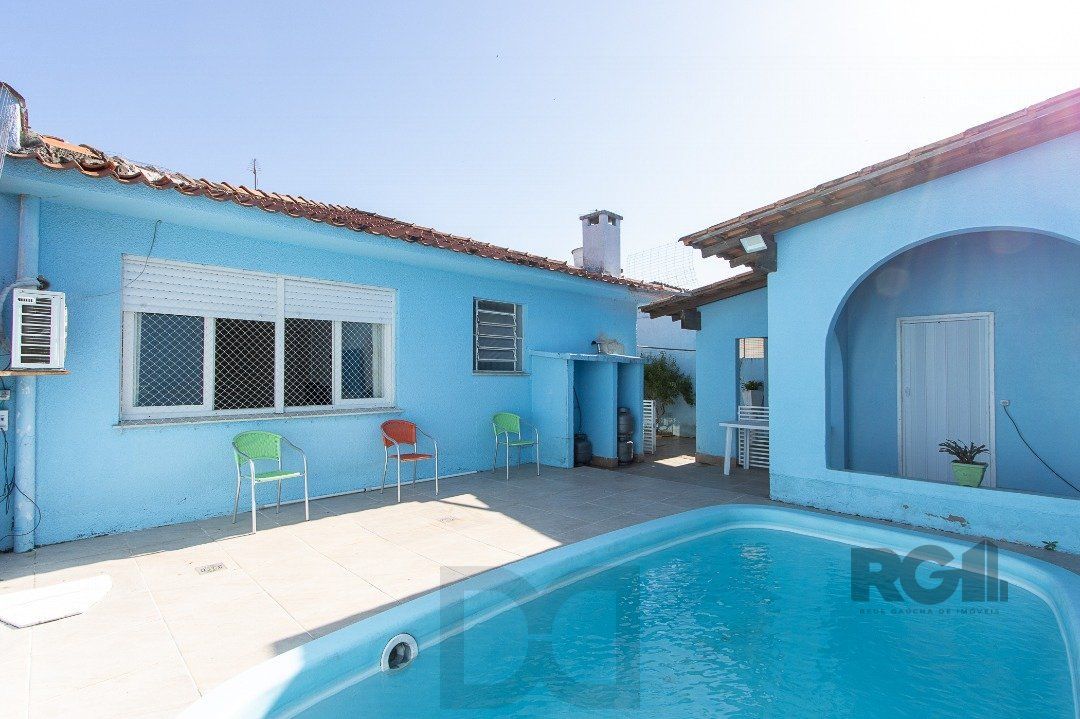 Casa térrea, com 3 dormitórios, 1 suíte, no bairro Ipanema. — foto 38