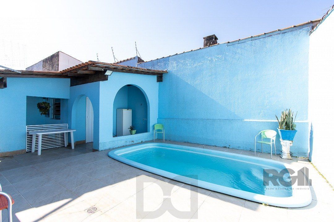 Casa térrea, com 3 dormitórios, 1 suíte, no bairro Ipanema. — foto 37