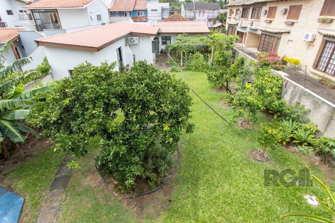 Casa térrea, 3 quartos, edícula, com 2 suites, pátio - Bairro Guarujá — foto 54