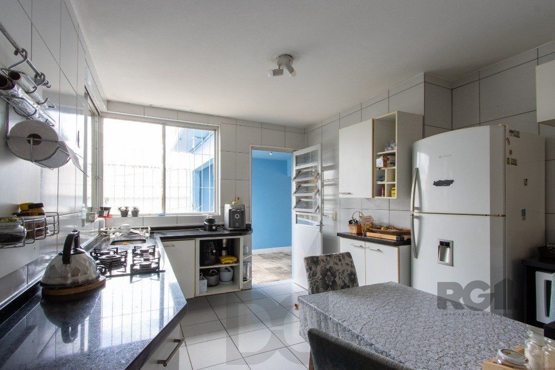 Casa, 5 dormitórios, sendo 1 suíte, 312m² privativos, 8 vagas - Bairro Vila Nova — foto 11