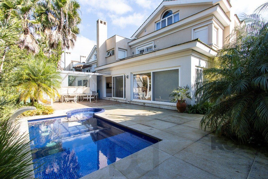 Casa no Condomínio Las Rocas, vista para o Guaíba, com 5 suítes — foto 25