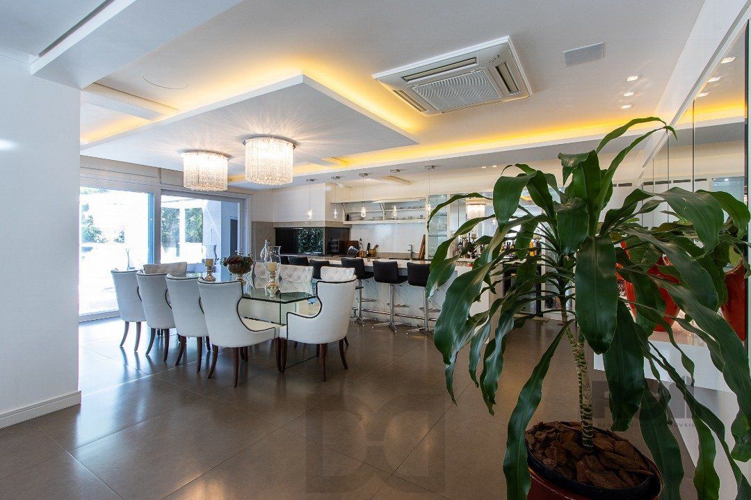 Casa no Condomínio Las Rocas, vista para o Guaíba, com 5 suítes — foto 18